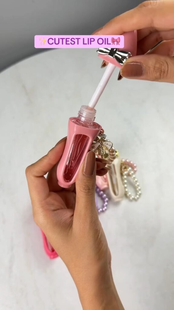 Cutest Bow-Charm Lip Oil | Glossy Tinted Lip Oil with Pearl Keychain | Travel-Friendly Mini Lip Care - Photo 2